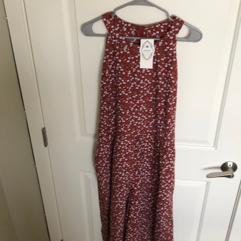 NWT rust floral jumpsuit!